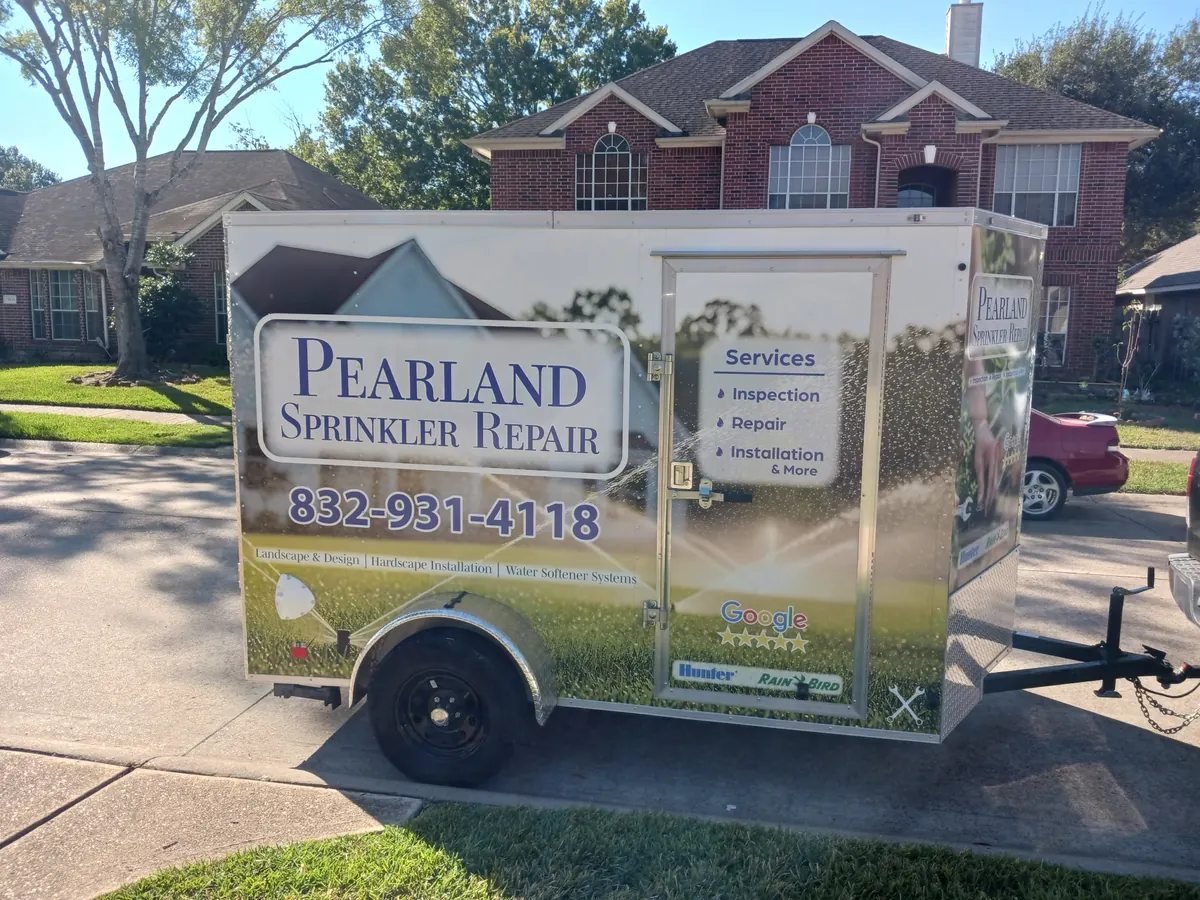 Pearland Sprinkler Repair branded service trailer ready for a job